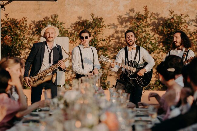 Acoustic musician performing during outdoor wedding ceremony in France