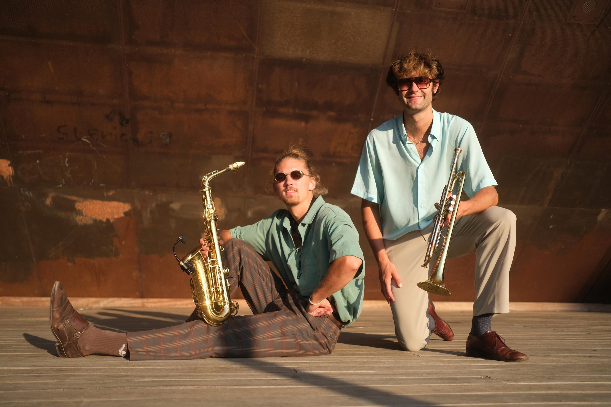 The Brian Brothers performing with saxophone and trumpet